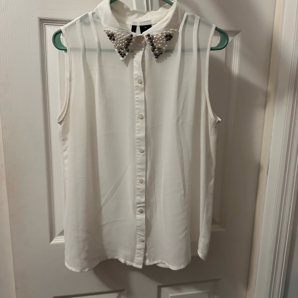 Elegant White Sleeveless Top with Embellished Collar